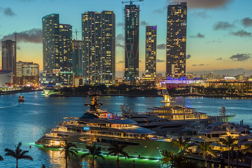 Miami Marina with 2 large boats with a backdrop of Miami Downtown buildings in the background