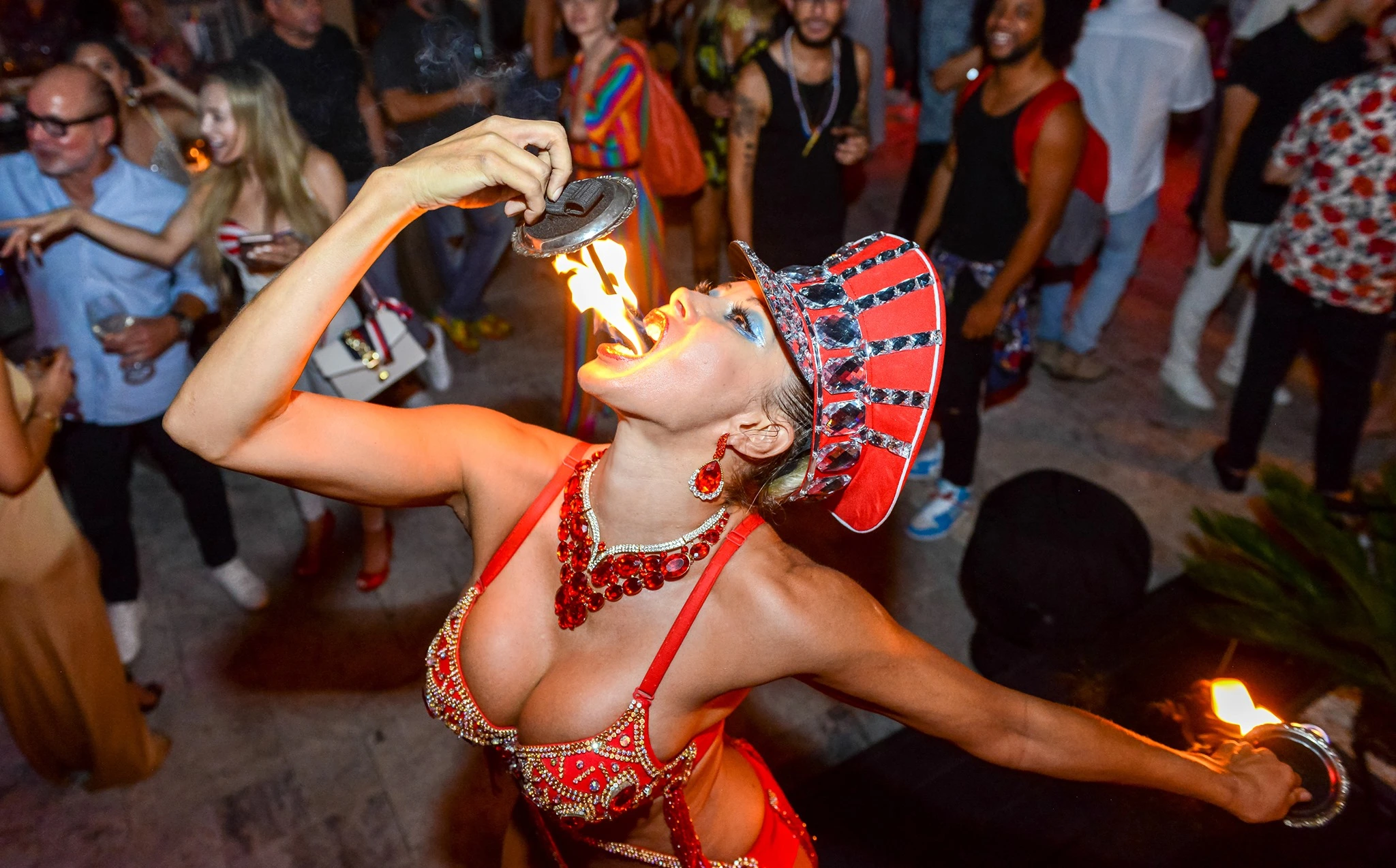 woman fire eating sword